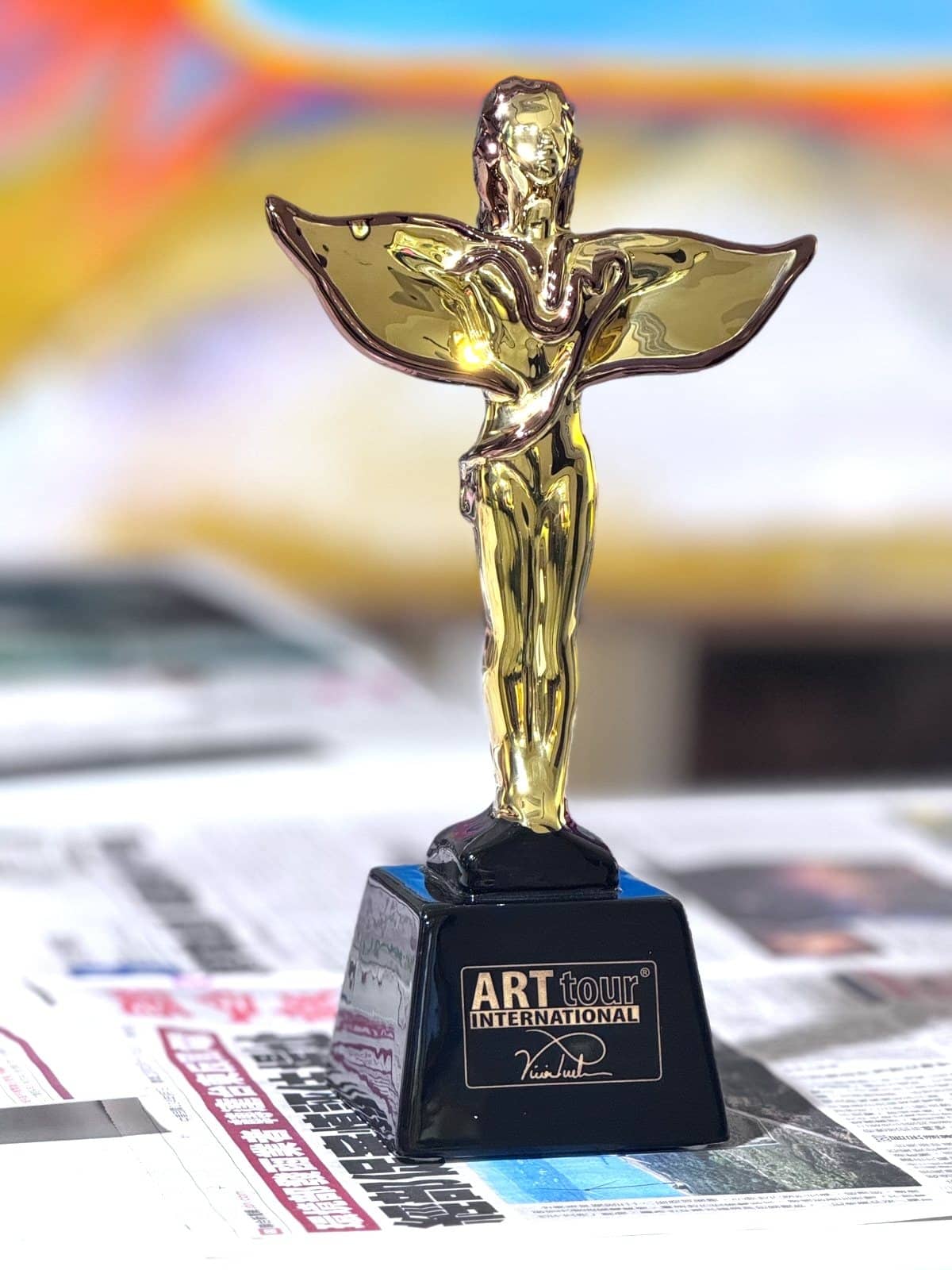 The Art Titan Award, an original sculpture created by Viviana Puello