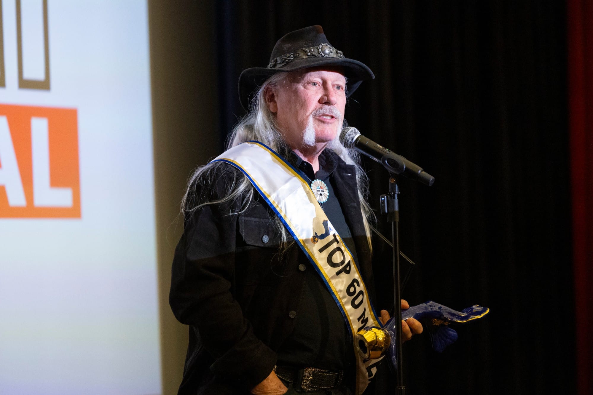 A 2024 honoree gives an acceptance speech