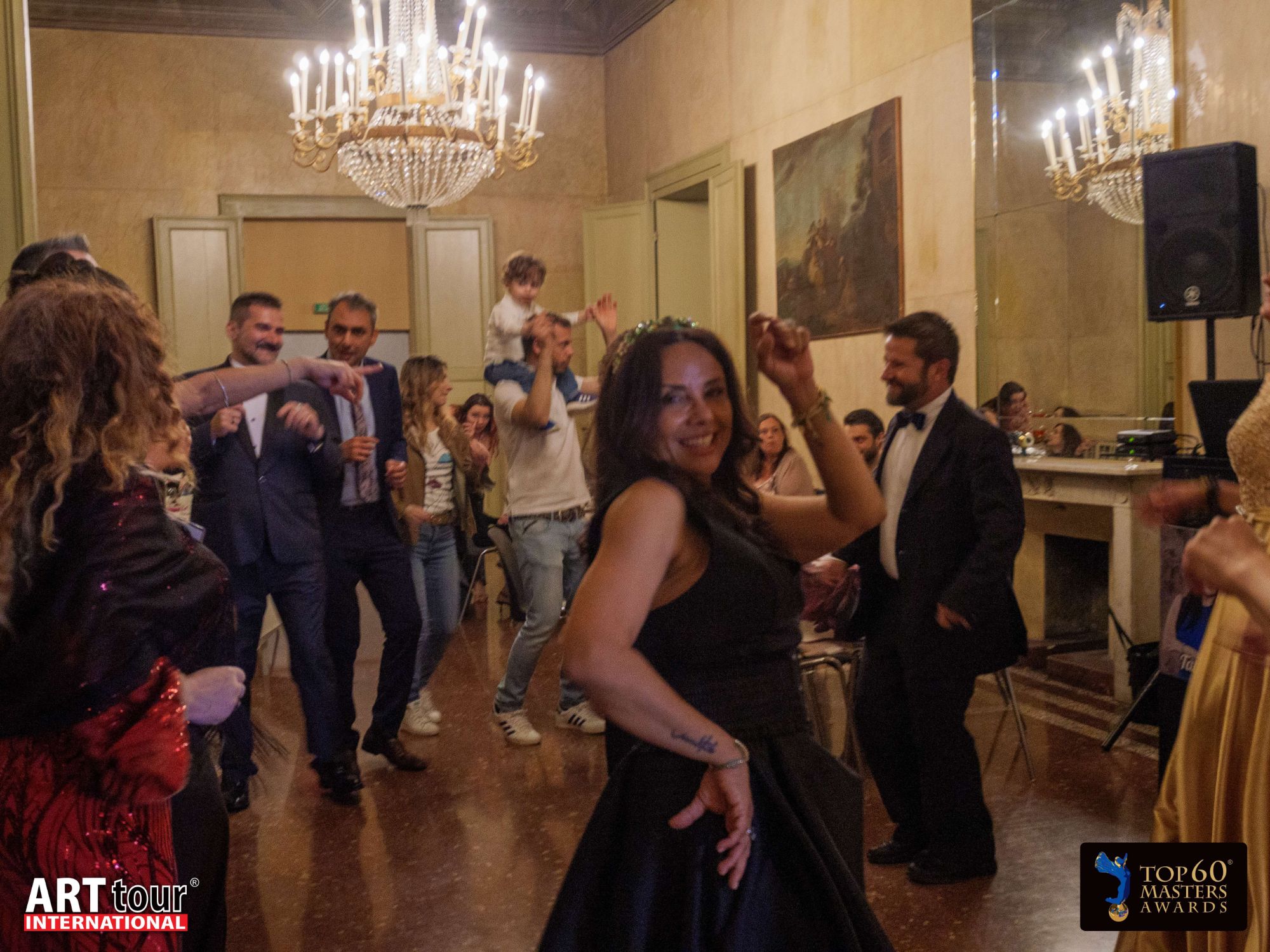Artists dancing together at the 2025 reception, Teatro Comunale di Ferrara, Italy